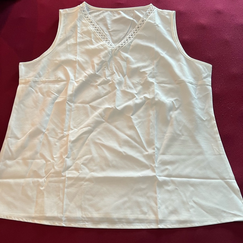 White woven sleeveless top.